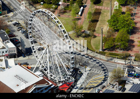`Downtown Atlanta in Georga USA skyline with he ferris wheel in the foreground Centennial Olympic Park is a 21-acre (85,000 m2) Stock Photo